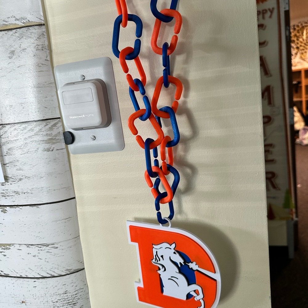 Orange and Blue Chain Necklace with Logo Pendant